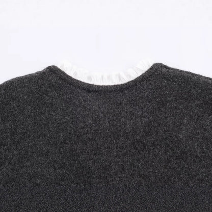 Color blocked patchwork long sleeved single breasted solid color knitted sweater for women